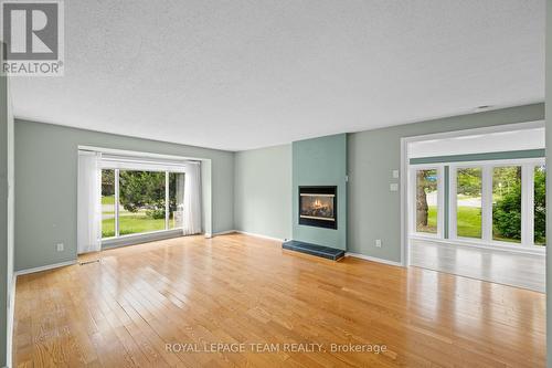 13 Arbor Ridge, Ottawa, ON - Indoor Photo Showing Living Room With Fireplace