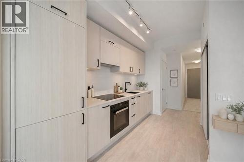 1 Quarrington Lane Unit# 1004, Toronto, ON - Indoor Photo Showing Kitchen With Upgraded Kitchen