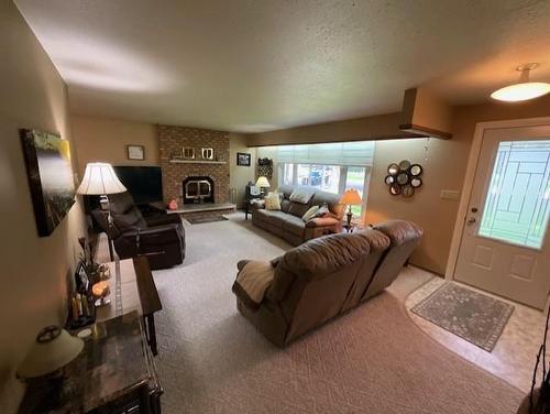 90 Mooswa Drive, Onanole, MB - Indoor With Fireplace