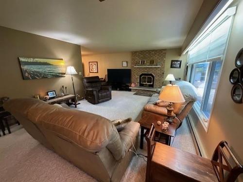 90 Mooswa Drive, Onanole, MB - Indoor With Fireplace