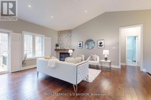 123 Desroches Trail, Tiny, ON - Indoor Photo Showing Living Room With Fireplace