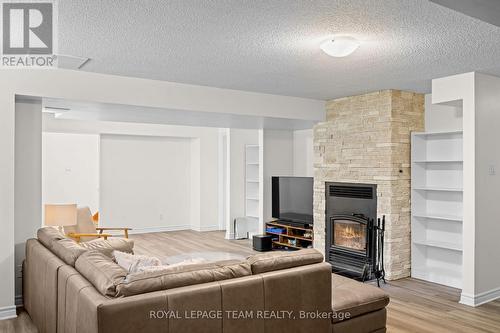 5040 Stonecrest Road, Ottawa, ON - Indoor Photo Showing Living Room With Fireplace
