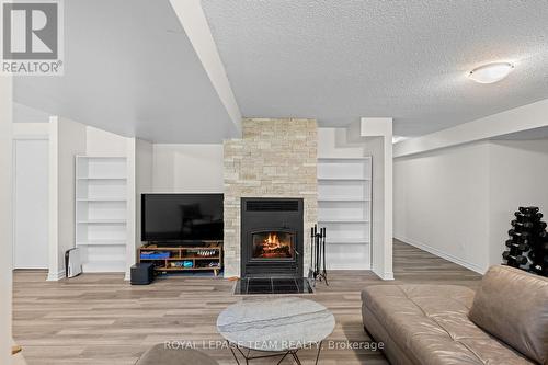 5040 Stonecrest Road, Ottawa, ON - Indoor Photo Showing Living Room With Fireplace