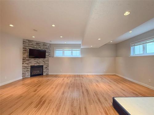 10 Maple Ridge Crescent, Brandon, MB - Indoor With Fireplace