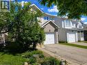 Front exterior featuring a single-car garage with an asphalt driveway - 732 Angler Way, Waterloo, ON  - Outdoor 
