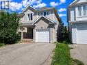 Two-story residence featuring light-colored siding and brick accents - 732 Angler Way, Waterloo, ON  - Outdoor 