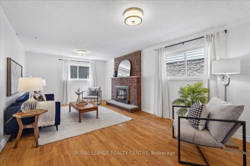 2770 Council Ring Road, Mississauga, ON - Indoor Photo Showing Living Room With Fireplace