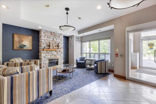 212-900 Bogart Mill Trail, Newmarket, ON - Indoor With Fireplace