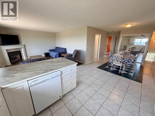 1037 Paradise Valley Subdivision, Dawson Creek, BC - Indoor Photo Showing Other Room With Fireplace