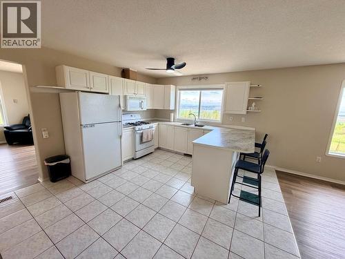 1037 Paradise Valley Subdivision, Dawson Creek, BC - Indoor Photo Showing Kitchen With Double Sink