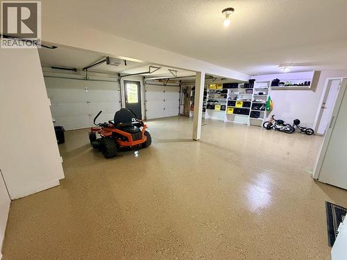 1037 Paradise Valley Subdivision, Dawson Creek, BC - Indoor Photo Showing Garage