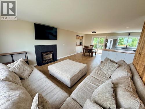 1037 Paradise Valley Subdivision, Dawson Creek, BC - Indoor Photo Showing Living Room With Fireplace