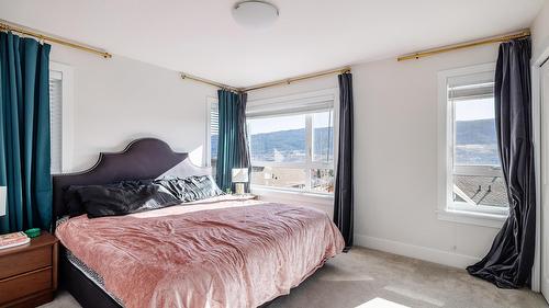 58-13098 Shoreline Way, Lake Country, BC - Indoor Photo Showing Bedroom