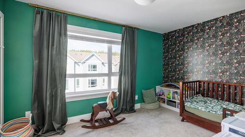 58-13098 Shoreline Way, Lake Country, BC - Indoor Photo Showing Bedroom