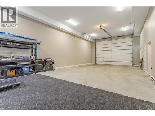 oversized garage - 3359 Cougar Road Unit# 71, West Kelowna, BC - Indoor Photo Showing Garage