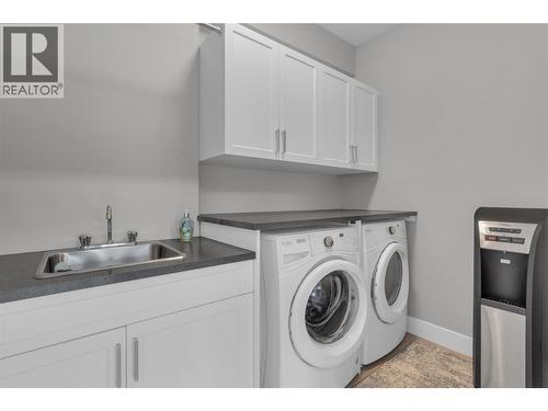 Laundry on main level - 3359 Cougar Road Unit# 71, West Kelowna, BC - Indoor Photo Showing Laundry Room