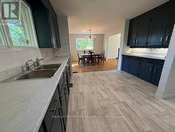 Updated kitchen to open floor plan dining area - 