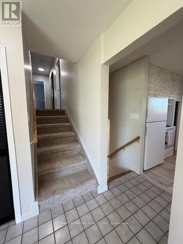 stairs to bedrooms of main house - 410 Green Lake Road, North Algona Wilberforce, ON 