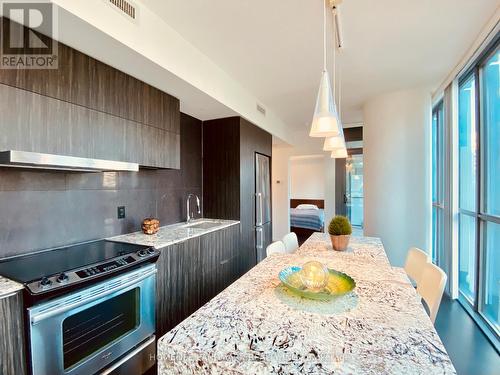 606 - 101 Charles Street E, Toronto, ON - Indoor Photo Showing Kitchen With Stainless Steel Kitchen With Upgraded Kitchen