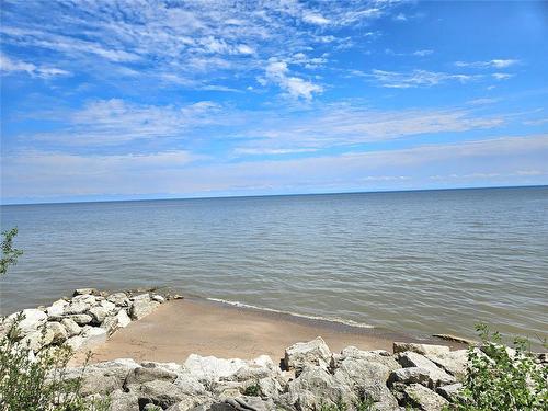 beach area - 2 Weeping Birch Avenue, Gimli Rm, MB - Outdoor With Body Of Water With View
