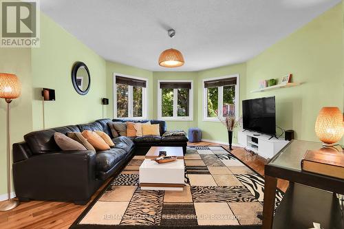 Bay wall of windows adorn living room - 22 Terrace Drive, Ottawa, ON 
