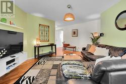 Hardwood flooring throughout main and upper floors - 