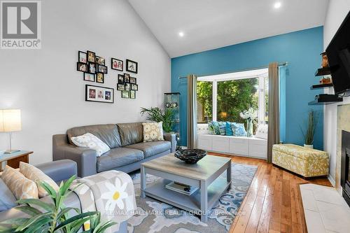 Family room with cathedral ceiling/pot lighting - 22 Terrace Drive, Ottawa, ON 