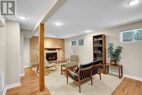 Lower level recreation room with fireplace - 39 Biscayne Crescent, Ottawa, ON 