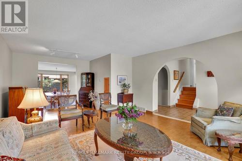 Stunning arch transitions to living room & kitchen - 39 Biscayne Crescent, Ottawa, ON 