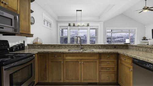 25-7760 Okanagan Landing Road, Vernon, BC - Indoor Photo Showing Kitchen With Double Sink