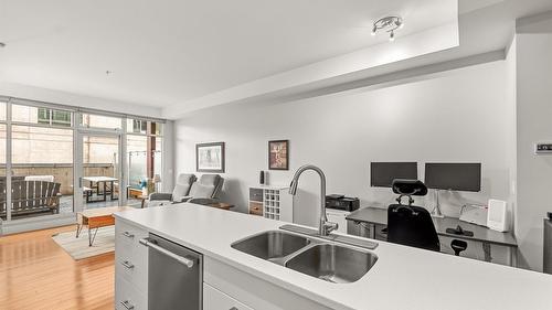 214-1289 Ellis Street, Kelowna, BC - Indoor Photo Showing Kitchen With Double Sink