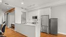 214-1289 Ellis Street, Kelowna, BC  - Indoor Photo Showing Kitchen With Double Sink 