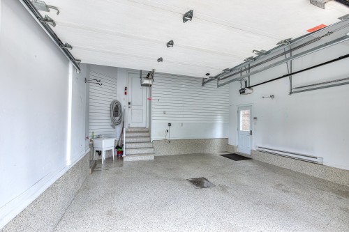 Garage - 423 Rue Des Roseaux, Laval (Sainte-Dorothée), QC - Indoor Photo Showing Garage