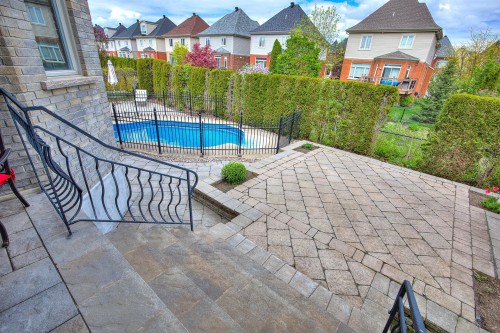 Cour - 423 Rue Des Roseaux, Laval (Sainte-Dorothée), QC - Outdoor With In Ground Pool