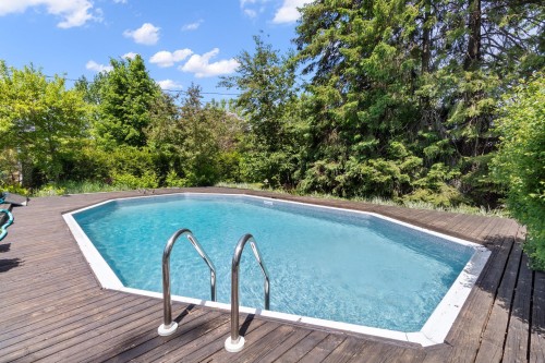 Piscine - 1214 Boul. Base-De-Roc, Joliette, QC - Outdoor With In Ground Pool With Deck Patio Veranda With Backyard