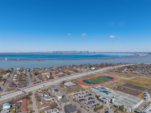 Vue d'ensemble - 40 Rue De Poitiers, Candiac, QC - Outdoor With Body Of Water With View