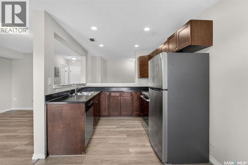 109 515 28Th Street E, Prince Albert, SK - Indoor Photo Showing Kitchen With Double Sink