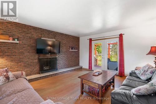 5687 Cherry Street, South Dundas, ON - Indoor Photo Showing Living Room With Fireplace