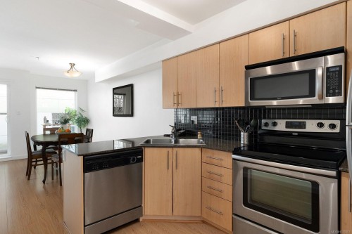 #204-1405 Esquimalt Rd, Esquimalt, BC - Indoor Photo Showing Kitchen With Stainless Steel Kitchen With Double Sink
