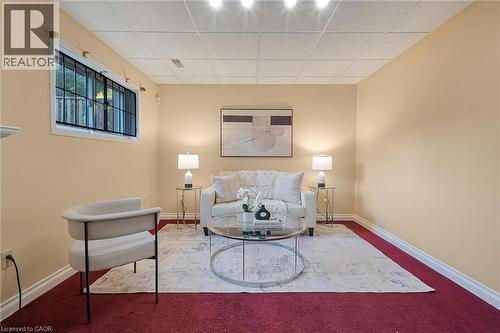 Recessed lighting illuminating a spacious room with a drop ceiling - 124 Dunsmere Drive, Kitchener, ON - Indoor Photo Showing Living Room
