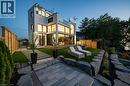 Modern architectural residence featuring multiple levels of glass balconies and expansive windows - 6 Firelane 11A Street, Niagara-On-The-Lake, ON  - Outdoor With Deck Patio Veranda 