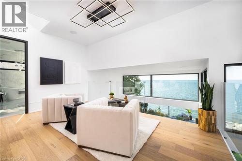 Expansive water frontage captured through floor-to-ceiling windows - 6 Firelane 11A Street, Niagara-On-The-Lake, ON - Indoor