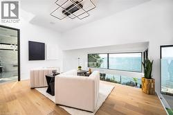 Expansive water frontage captured through floor-to-ceiling windows - 