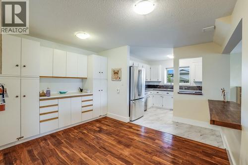 Lower Level Kitchen With Ample Cabinetry And Storage - 3137 Vector Drive, West Kelowna, BC 