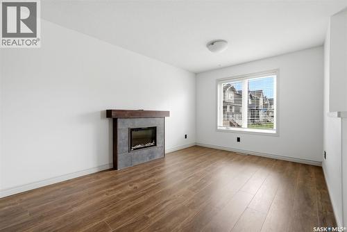 4348 Shaffer Street, Regina, SK - Indoor Photo Showing Living Room With Fireplace