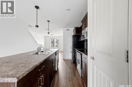 4348 Shaffer Street, Regina, SK - Indoor Photo Showing Kitchen With Double Sink