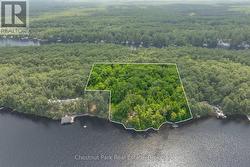 Lot lines approximate 5.7-ac parcel with 270 ft - 