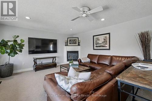 8 Zaduk Place, Guelph (Kortright East), ON - Indoor Photo Showing Living Room With Fireplace