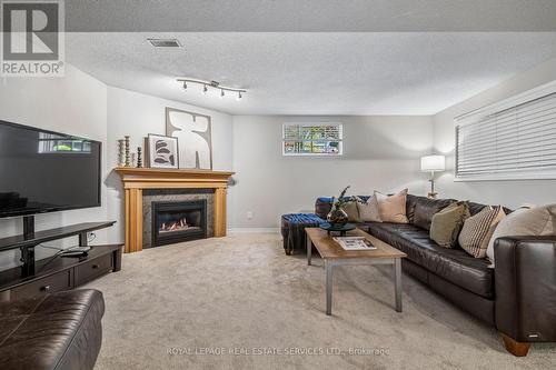 39 Liam Drive, Hamilton, ON - Indoor Photo Showing Living Room With Fireplace