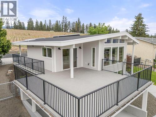 Beautifully renovated inside and out! Enjoy the lake views from the expansive upper deck - 1315 Dehart Road, Kelowna, BC 